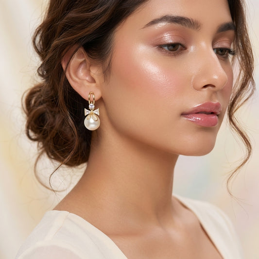 Golden Bow Pearl Drop Earrings