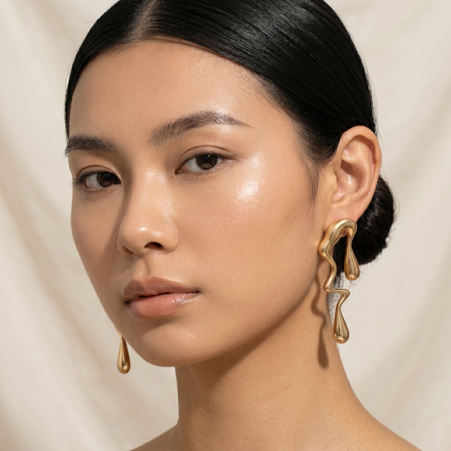 Golden Fluid Drop Earrings