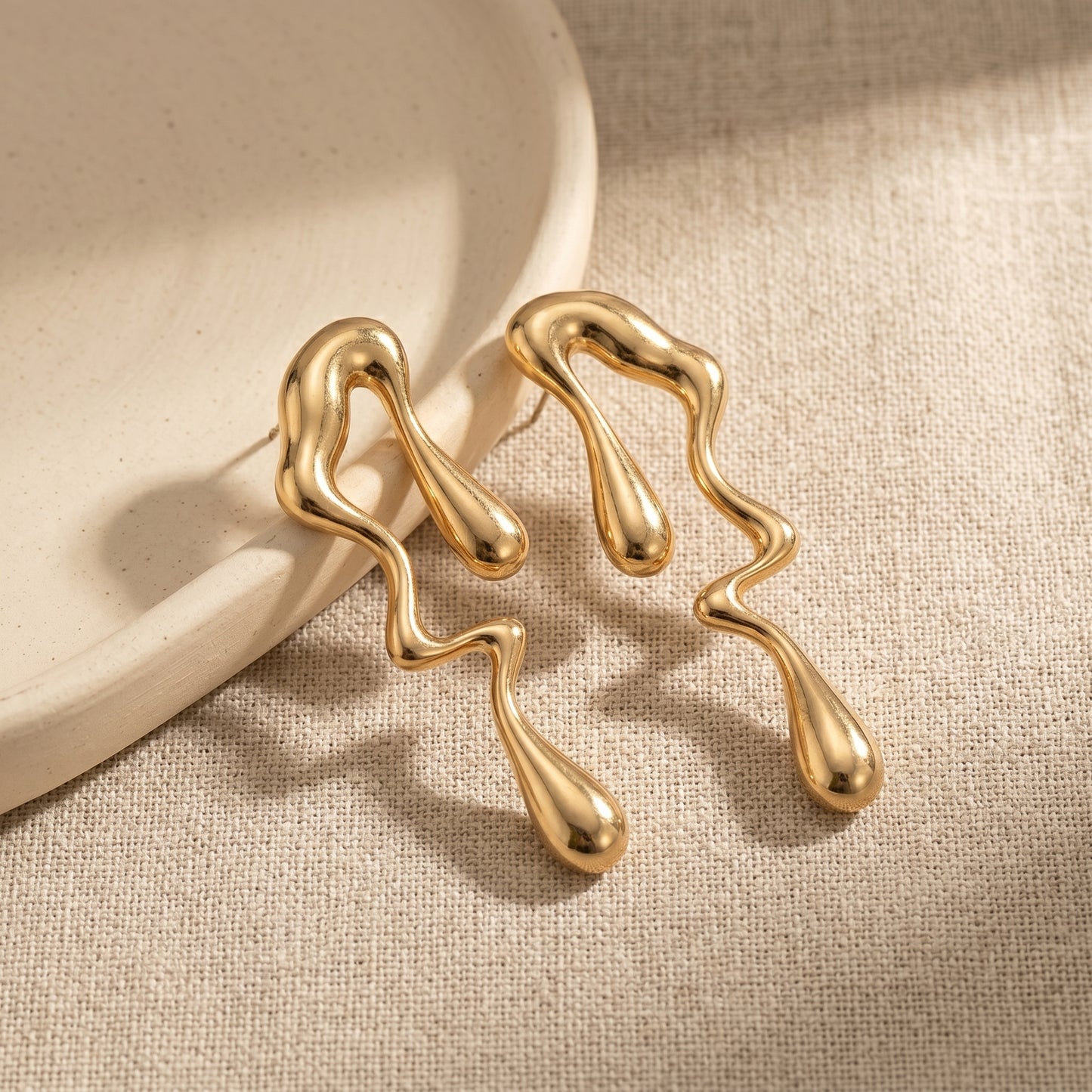 Golden Fluid Drop Earrings