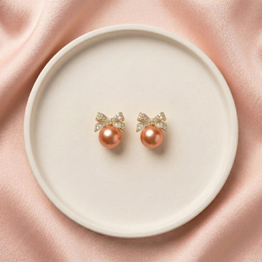 Blush Bow Pearl Stud Earrings