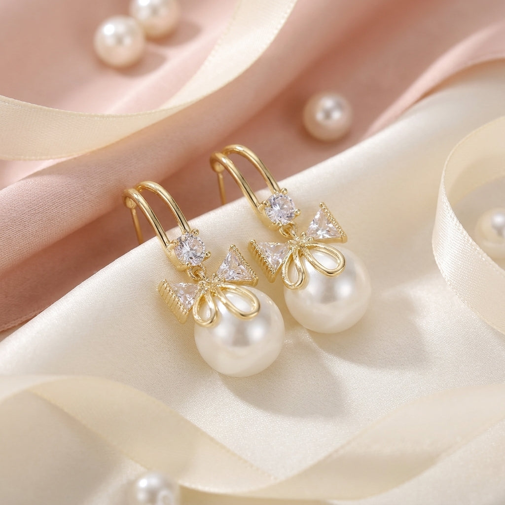 Golden Bow Pearl Drop Earrings
